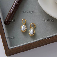 Remi Pearl Huggie Hoops — features